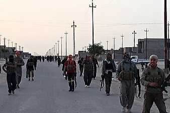 Iraq crisis: Shia volunteers confront Sunni insurgents in Samarra