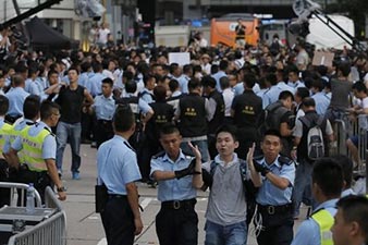 Hong Kong police arrest democracy protesters at sit-in    