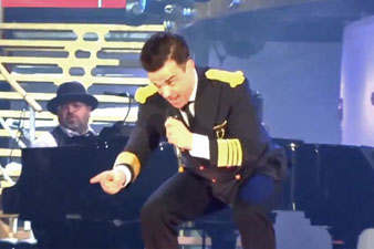 Robbie Williams breaks fan's arm falling off stage