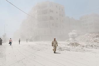 Syrian troops march toward Aleppo