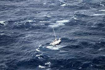 Ship rescues 3 stranded in rough seas off Hawaii