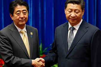 China and Japan hold ice-breaker talks at Apec summit