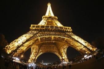 When did the Eiffel Tower open? Shortly before the fall of the British version