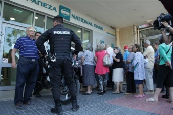 Banks reopen after three-week shutdown. Greece