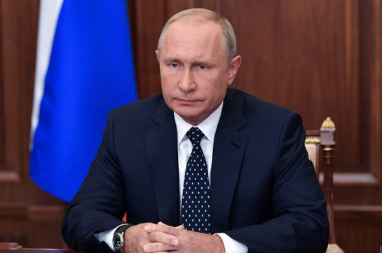 Putin dilutes unpopular pension reform that has hurt his popularity