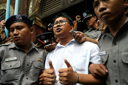 Myanmar court jails Reuters reporters for seven years in landmark secrets case