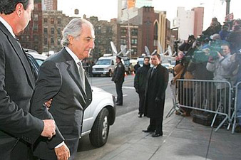 Madoff pleads guilty to 11 charges