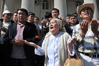 Relatives of victims of clashes hold a rally in Bishkek