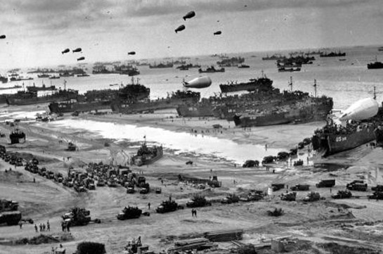 D-Day: May and Macron in France to mark 75th anniversary