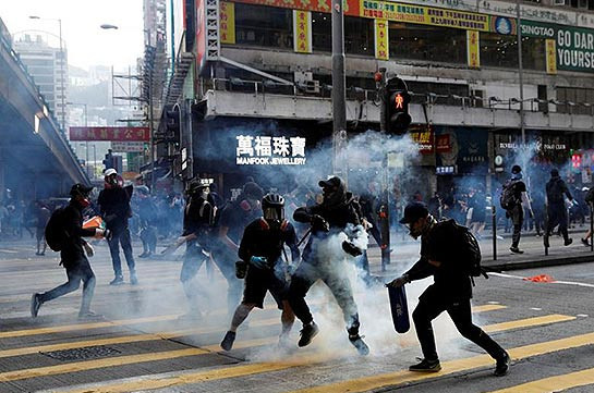 Scores injured in chaotic weekend of Hong Kong protests