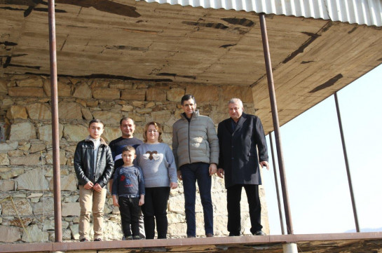 From semi-demolished clay structure to a new house